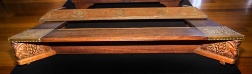Timber and leather fire fender.