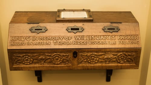 Willis James Parker memorial alms box.