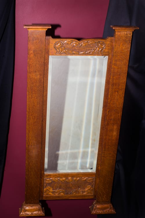 Mirror carved for Mollie Field.